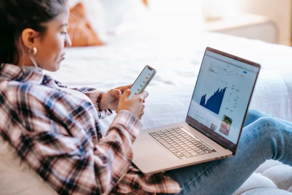 young woman monitoring her investments