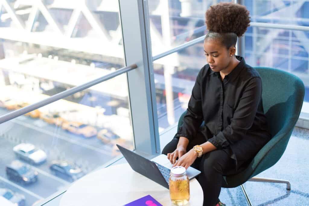 woman working on laptop in an office