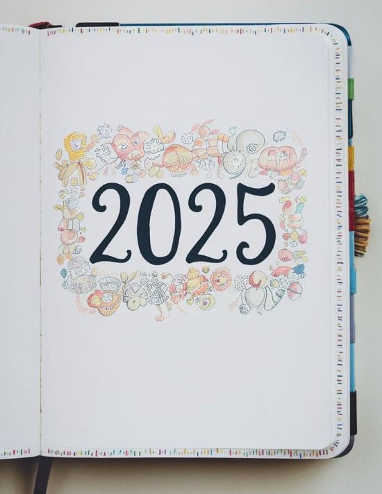 bullet journal cover page with the year 2025 written in the middle